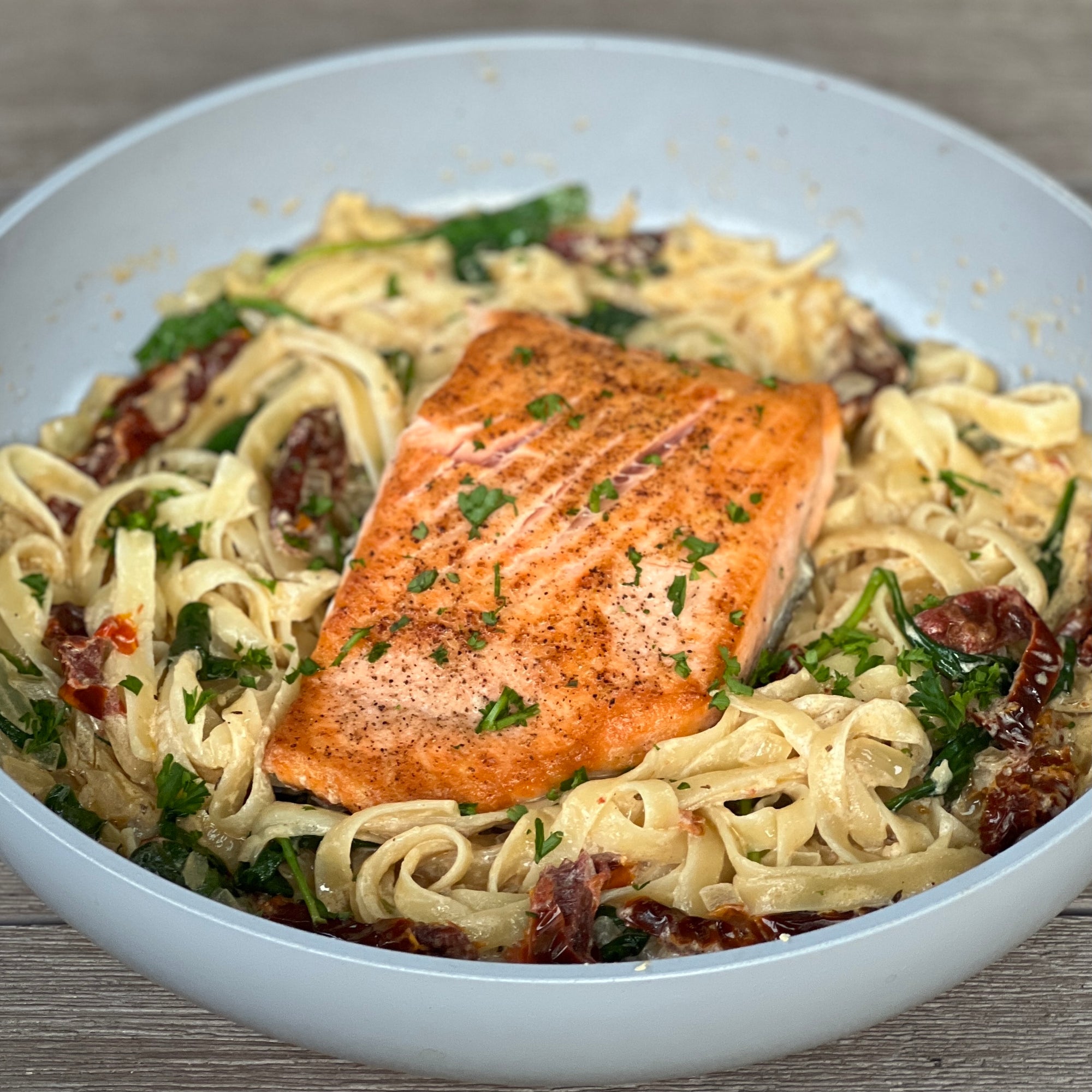 Creamy Salmon Pasta with Sun Dried Tomato Garlic Sauce