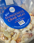 Wild caught Dungeness crab meat pieces in a frozen package from Premier Catch.