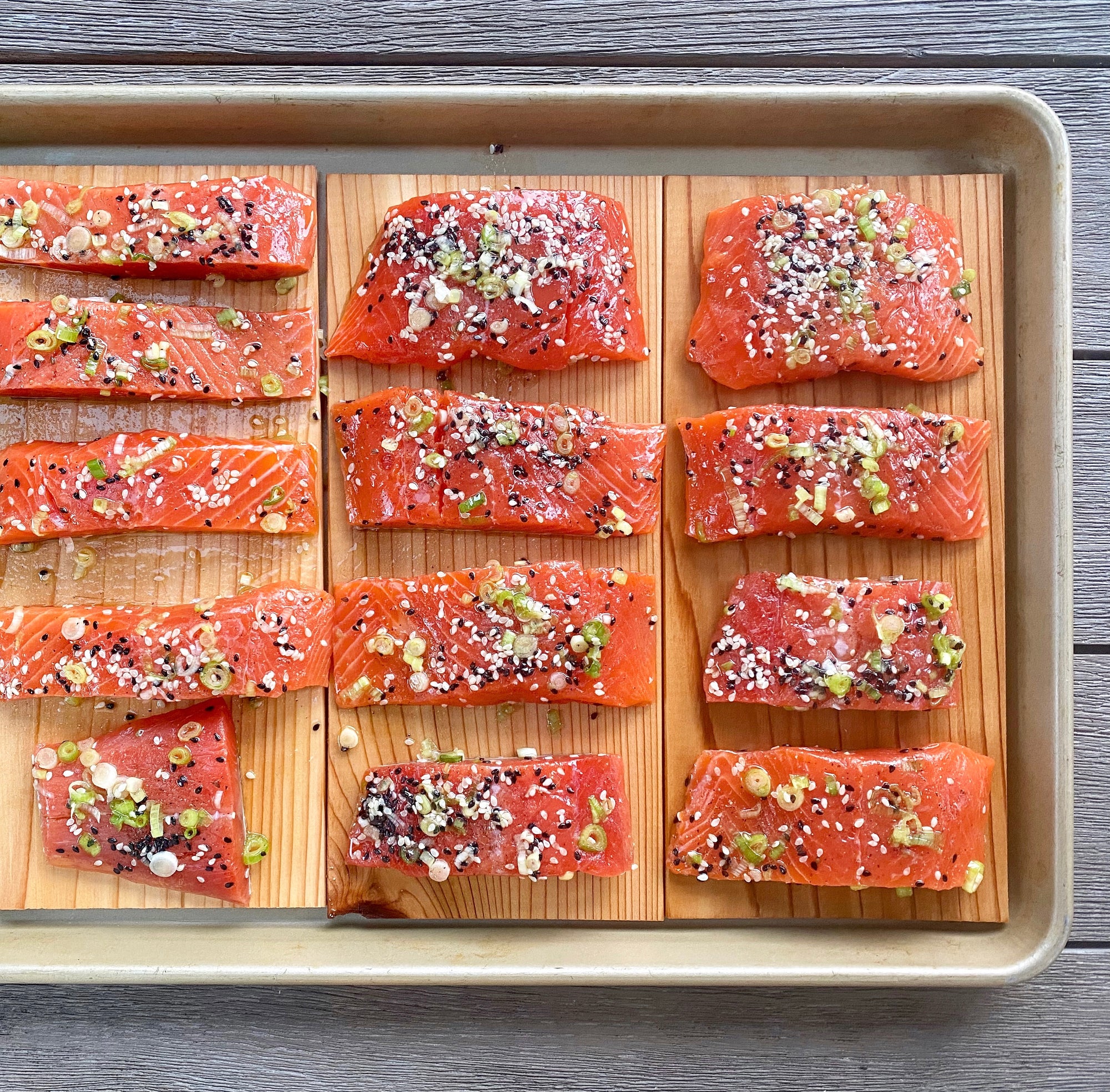 Cedar grilling planks on a pan for cooking in the oven