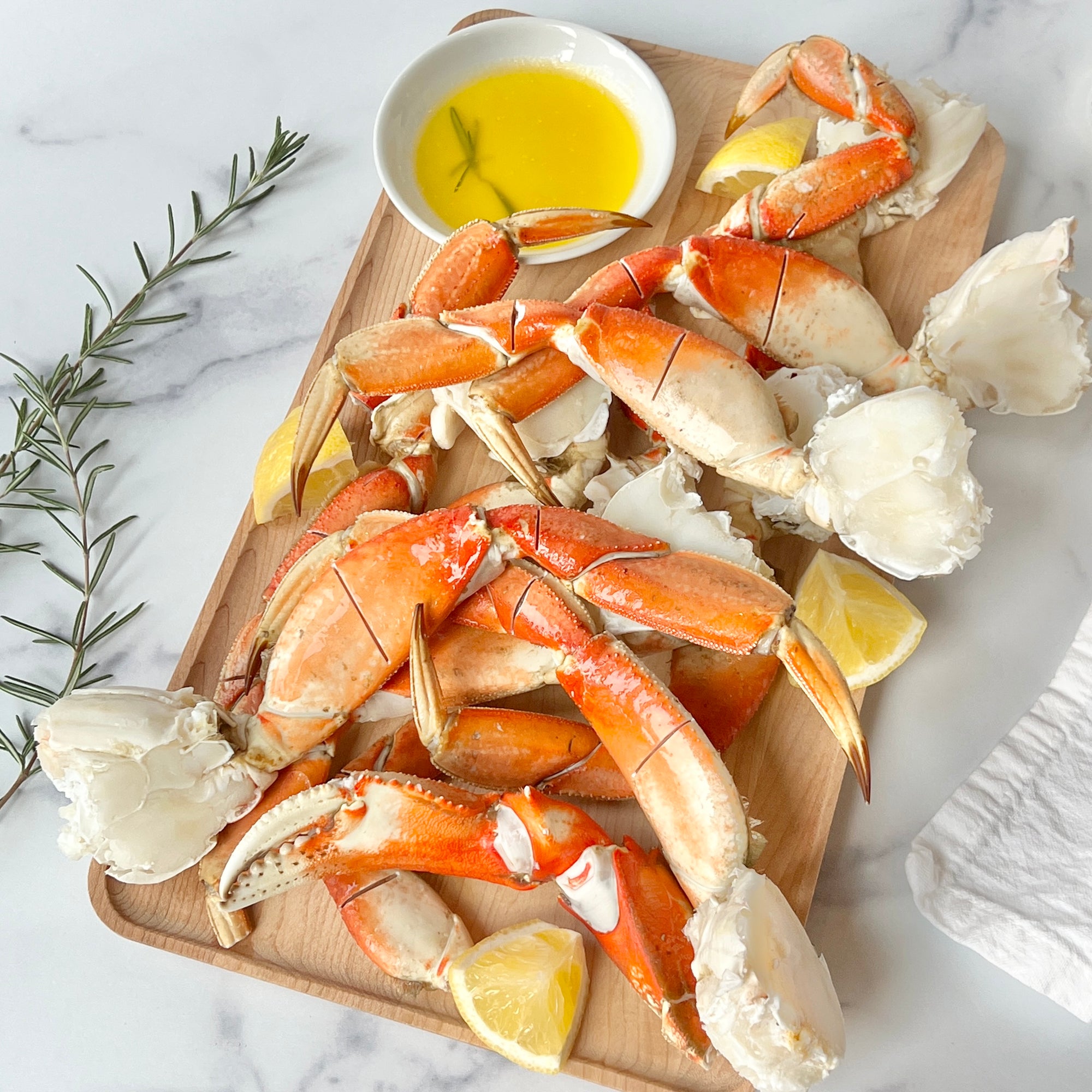 2 pounds of wild caught Dungeness crab legs on a serving platter