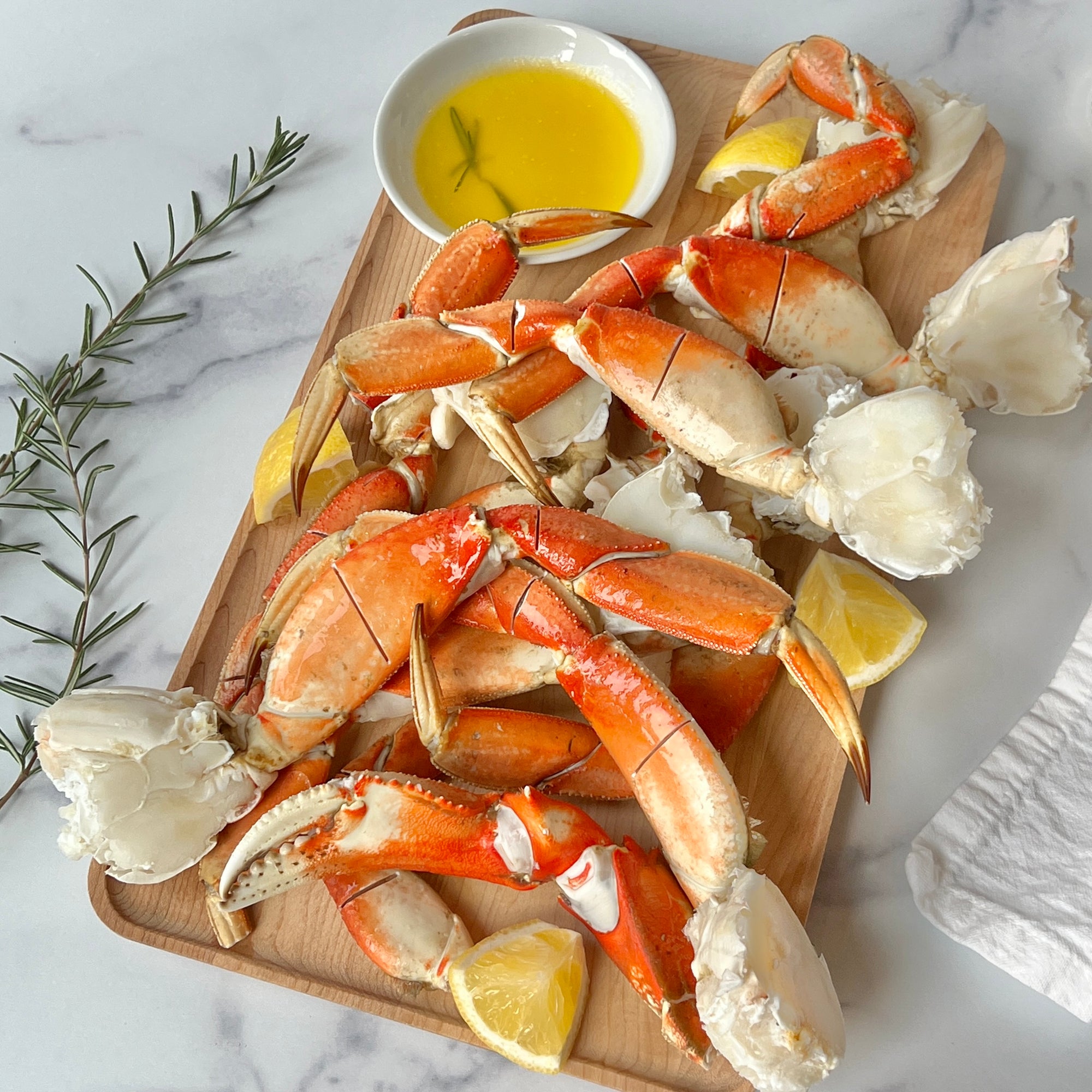 Dungeness Crab Legs square ready to eat on platter