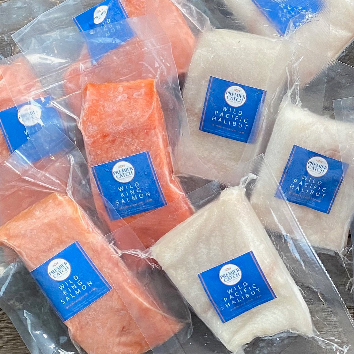 Frozen packaged wild king salmon and wild pacific halibut portions