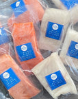 Frozen packaged wild king salmon and wild pacific halibut portions