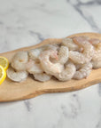 Image of wild Gulf shrimp on chopping board with lime