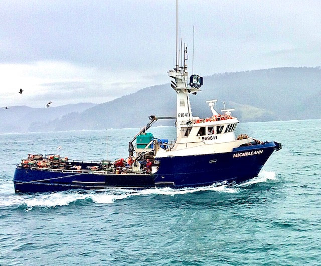 Fishing vessel in the Pacific Northwest US, where Premier Catch Dungeness crab legs are sustainably caught.